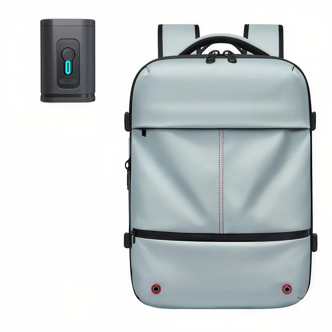 Sac à dos argenté antivol 40L avec accents noirs et coutures rouges