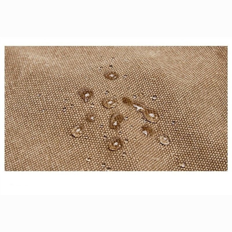 Tissu déperlant avec gouttes visibles sur le sac à dos de voyage à bandoulière