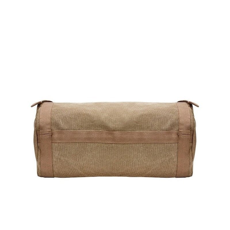 Sac à dos de voyage à bandoulière en toile marron avec une seule bandoulière horizontale
