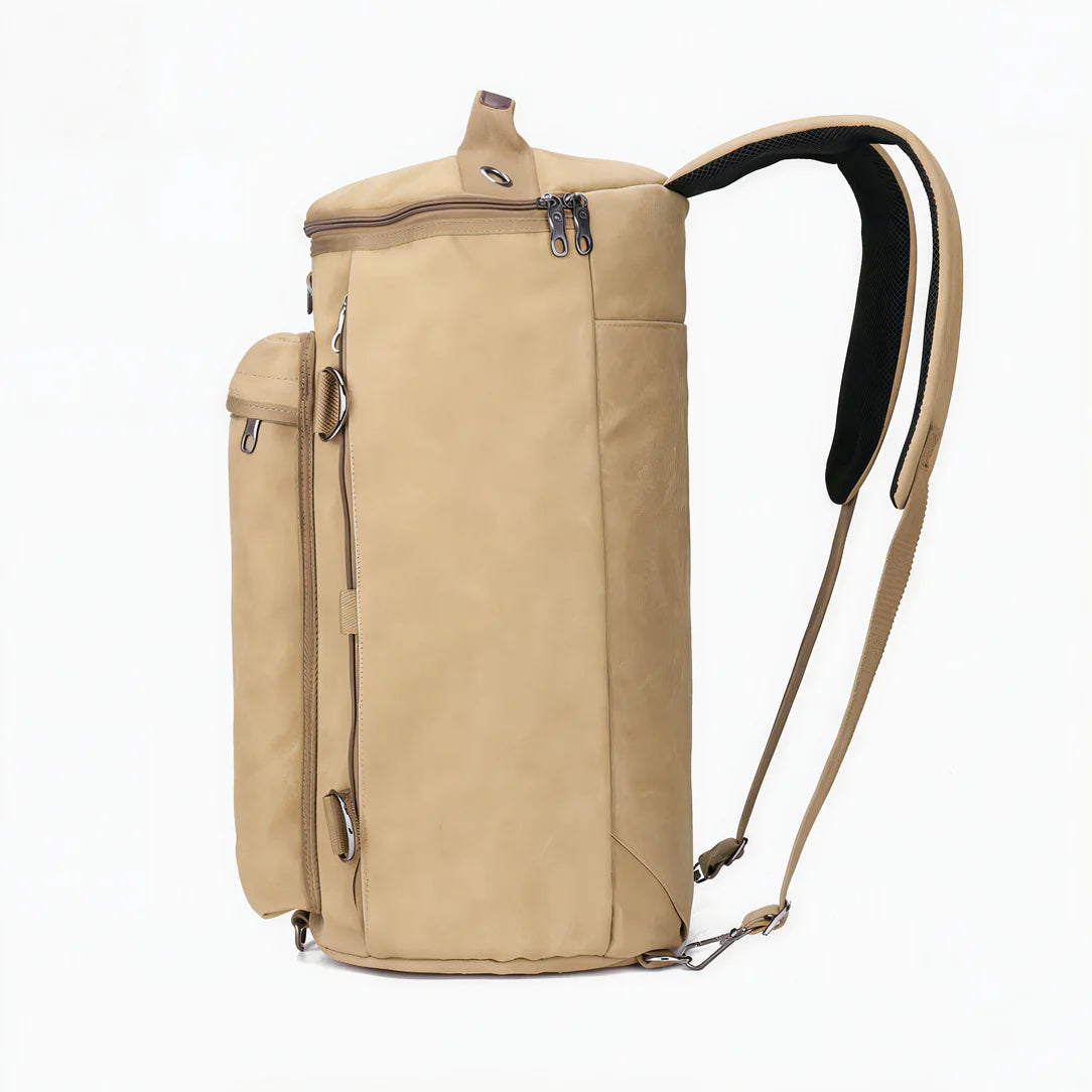 Sac à dos de voyage beige en toile avec bretelles rembourrées noires et fermetures éclair multiples