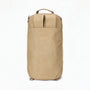 Sac à dos de voyage beige en toile avec anse supérieure et poche zippée avant