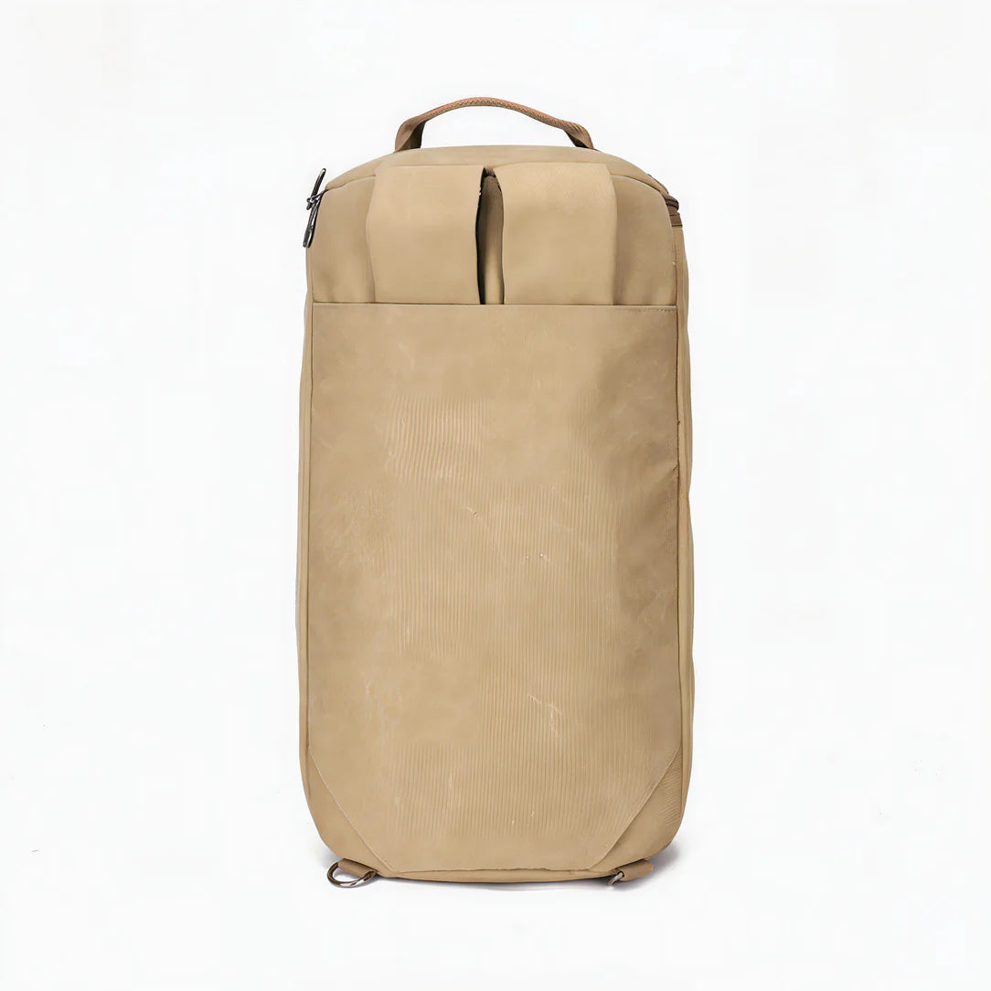Sac à dos de voyage beige en toile avec anse supérieure et poche zippée avant
