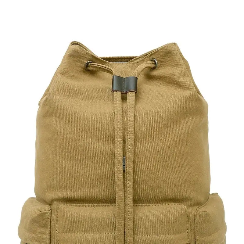 Sac à dos de voyage en toile avec cordon en toile beige et accent en cuir foncé