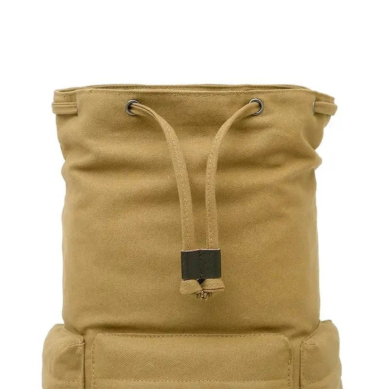 Sac à dos de voyage en toile en canvas beige avec cordons de serrage