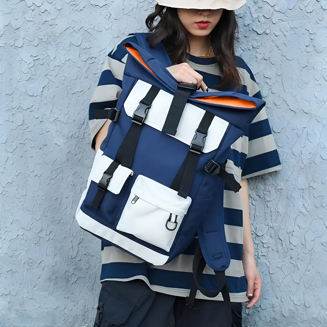Sac à dos de voyage vintage en toile bleu marine et blanc avec poches et boucles