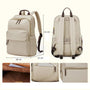 Sac à dos d’université femme beige avec compartiments, accents marron, vues intérieures et mesures