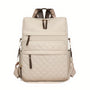 Sac à dos effet matelassé beige avec accents en cuir marron et bretelles ajustables