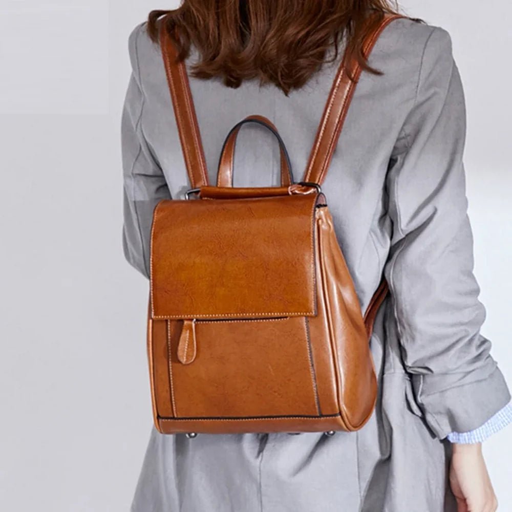 Sac à dos en cuir de vachette marron avec rabat avant et poignée supérieure