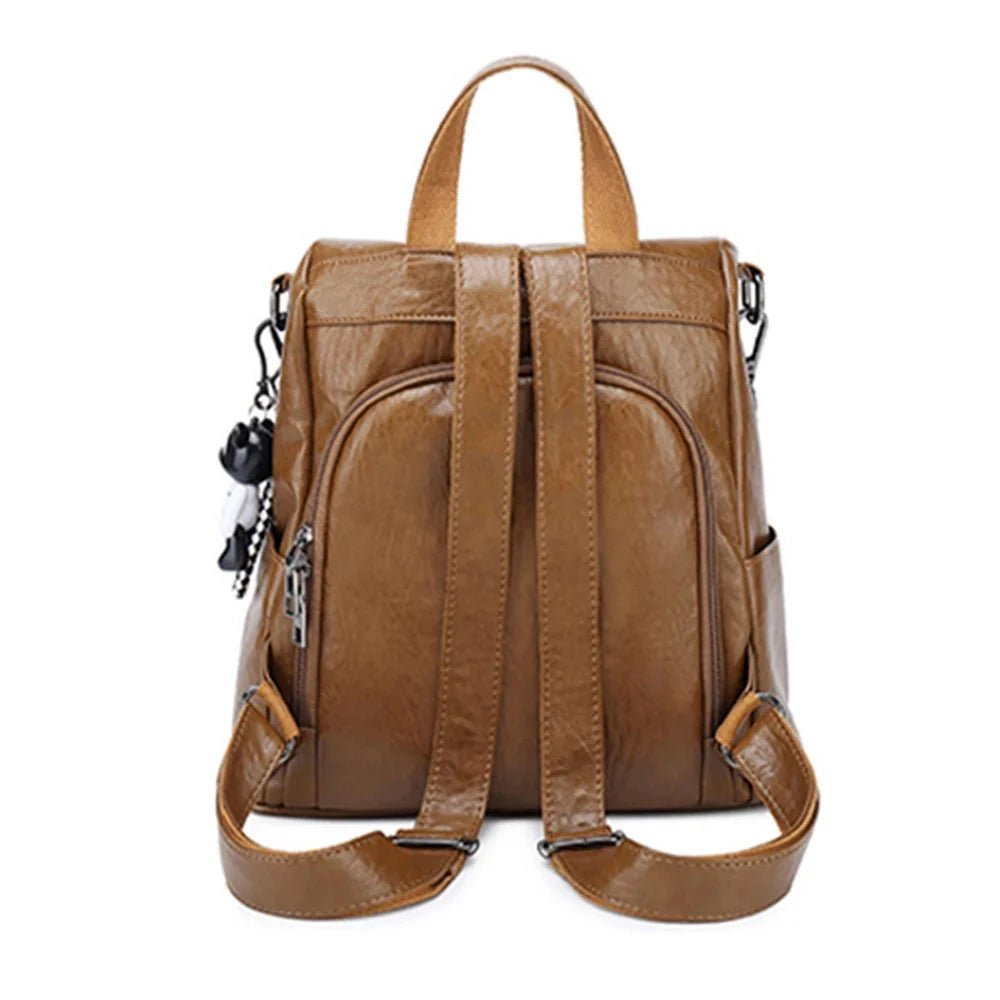 Sac à dos en cuir marron avec anti-vol, bretelles ajustables et poignée supérieure