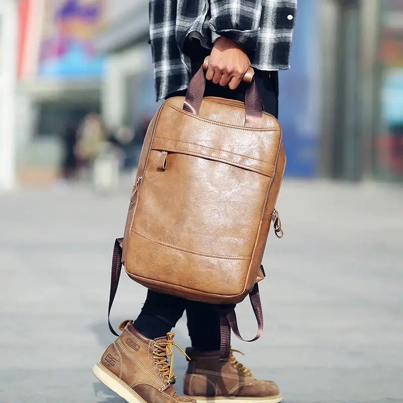 Sac à dos en cuir pour homme marron avec plusieurs compartiments et bretelles ajustables