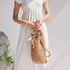 Sac à dos en paille chic avec sac en paille à cordon en paille et style tendance