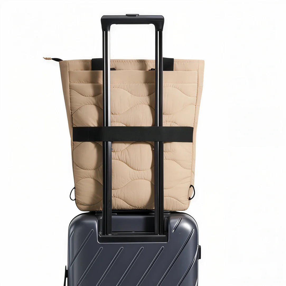 Sac à dos beige matelassé Bagsmart avec sangle et poignée noire, idéal pour bagages