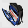 Sac à dos ergonomique noir et bleu avec plusieurs compartiments et objets à l’intérieur