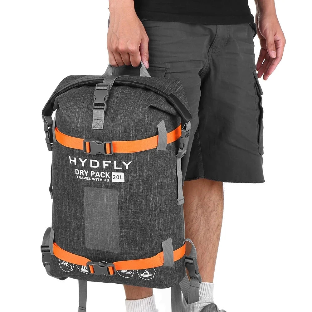 Sac à dos étanche 20 L en gris foncé avec bretelles et boucles orange brillantes