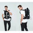 Sac à dos étanche de trail 30L noir LONGHIKER avec accents blancs, bretelles et ceinture