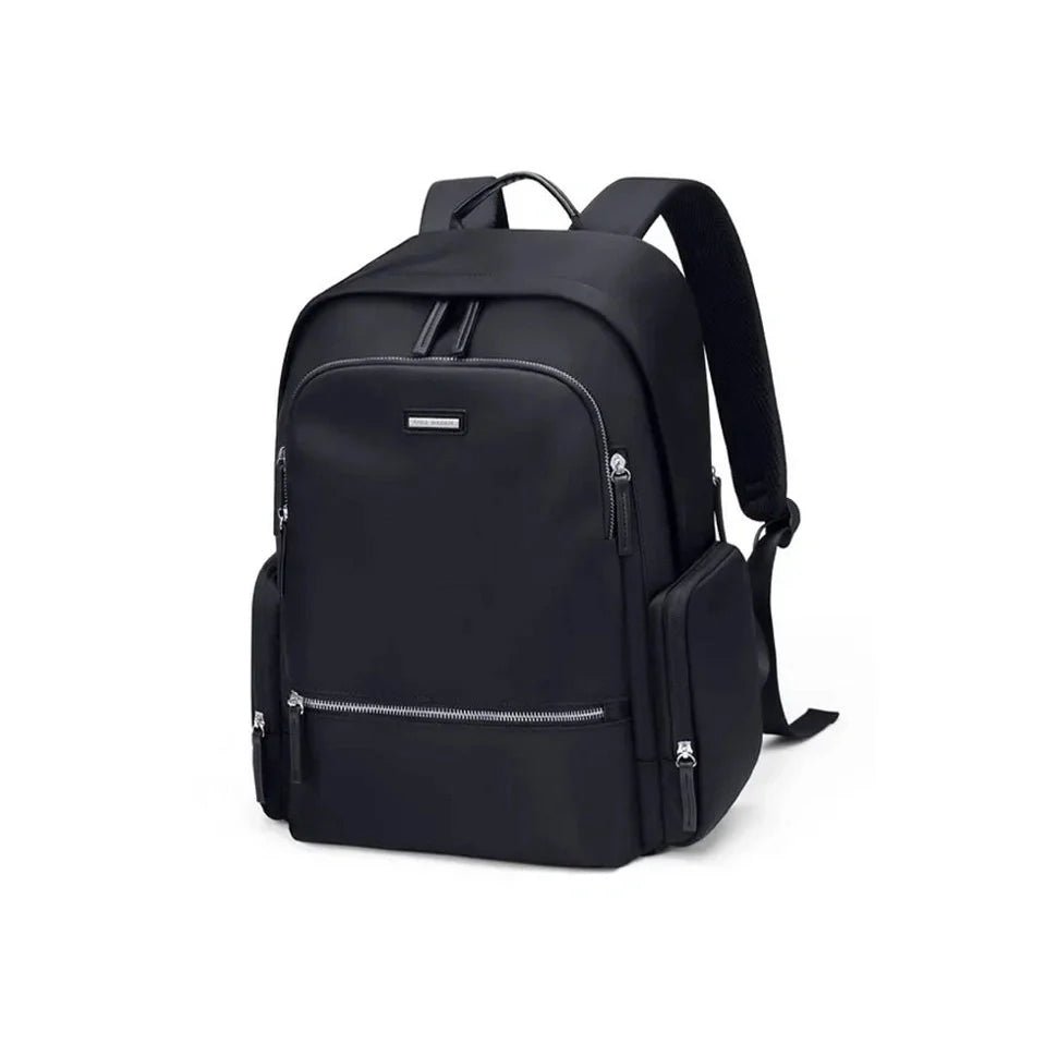 Sac à dos étudiant femme en tissu noir avec plusieurs compartiments zippés et bretelles ajustables