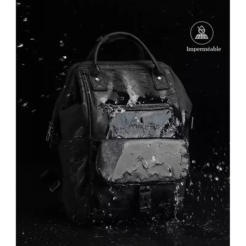Sac à dos fashion noir imperméable avec des gouttes d’eau sur la surface