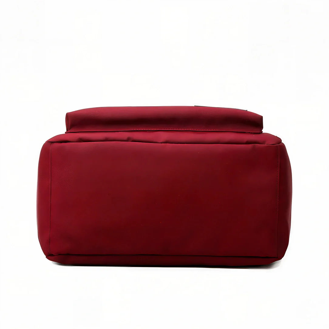 Ottomane en cuir rouge design minimaliste texture lisse Fémina Escape