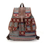 Sac à dos femme en toile imprimée rouge et blanche avec accents en faux cuir brun
