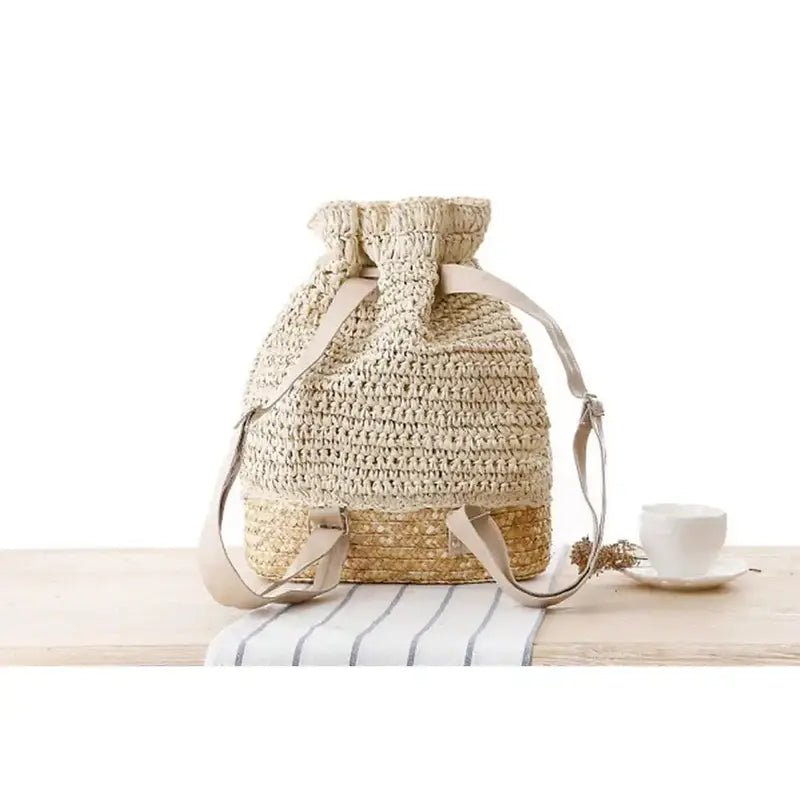Sac à dos femme paille en paille tressée avec bretelles ajustables et cordon de serrage