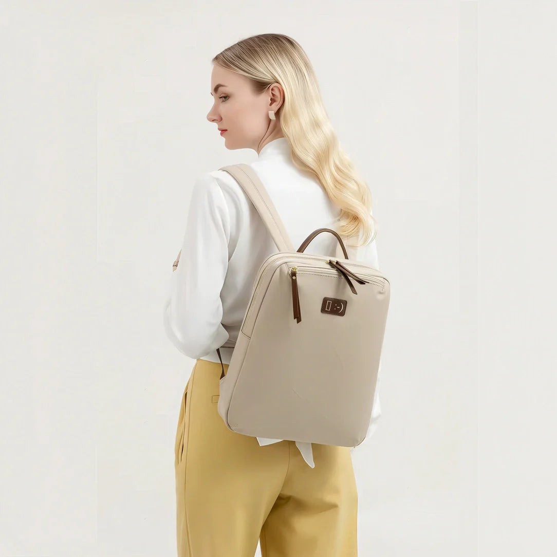 Sac à dos femme beige minimaliste avec accents noirs pour PC 14 pouces Transit