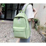 Sac à dos fille 10 ans vert clair avec design de marguerites