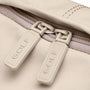 Zipper pullers beige sur Sac à dos Golf Boréal avec texte embossé
