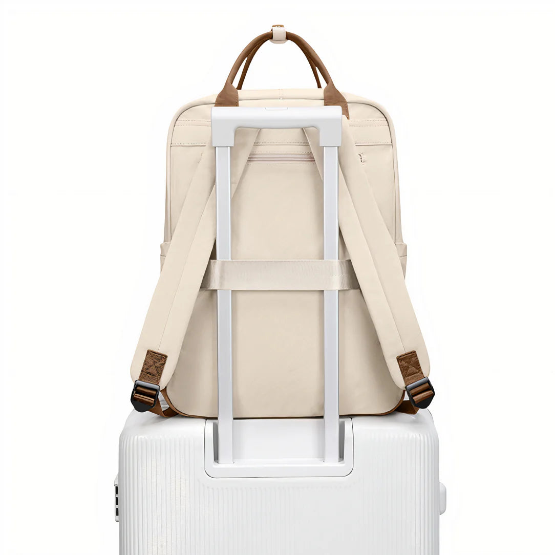 Sac à dos Golf Boréal crème avec accents en cuir marron et roues blanches pour voyager