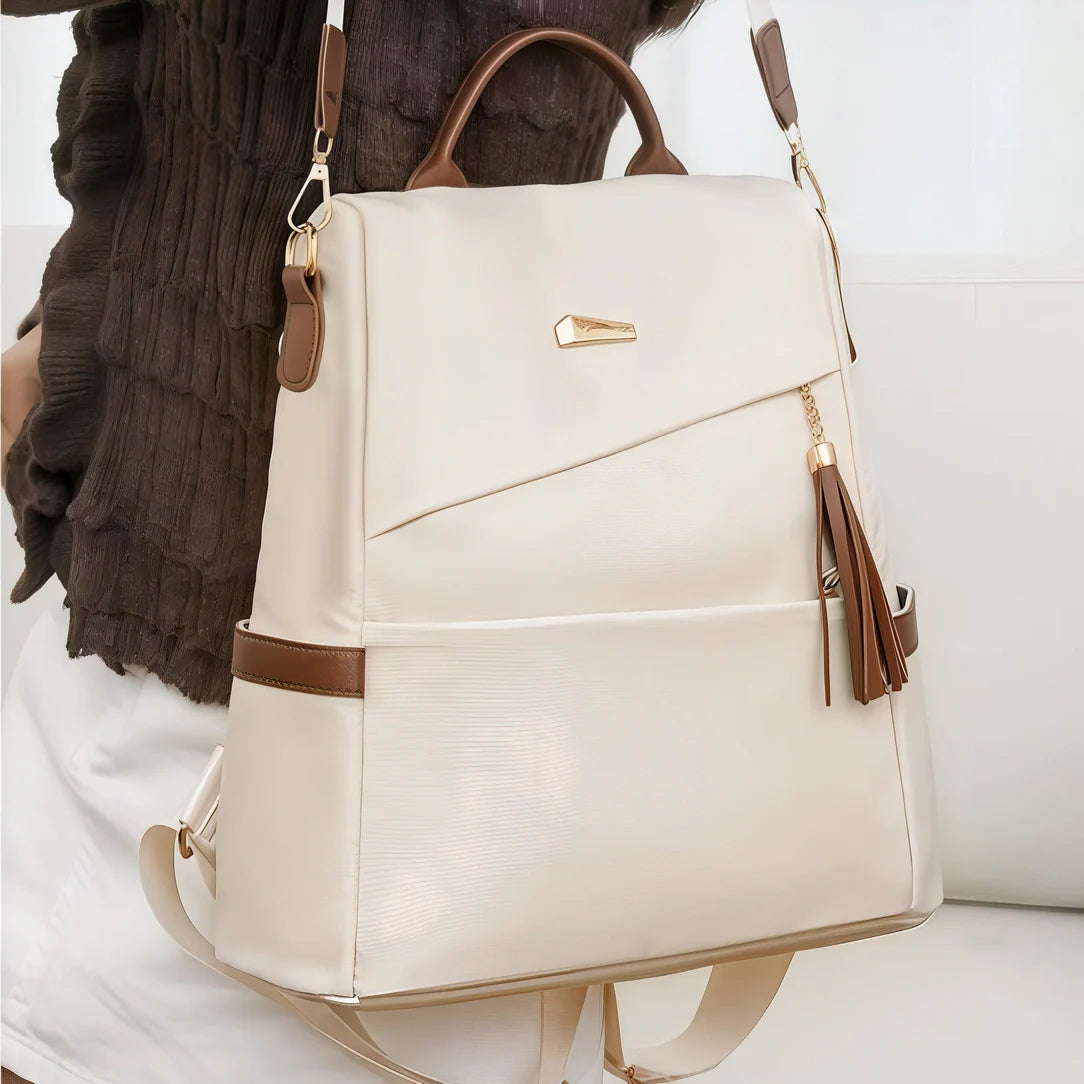 Sac à dos Graine d’Or crème avec accents marron, gland et fermoir doré