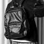 Sac à dos homme cuir noir en faux cuir avec deux poches frontales élégantes