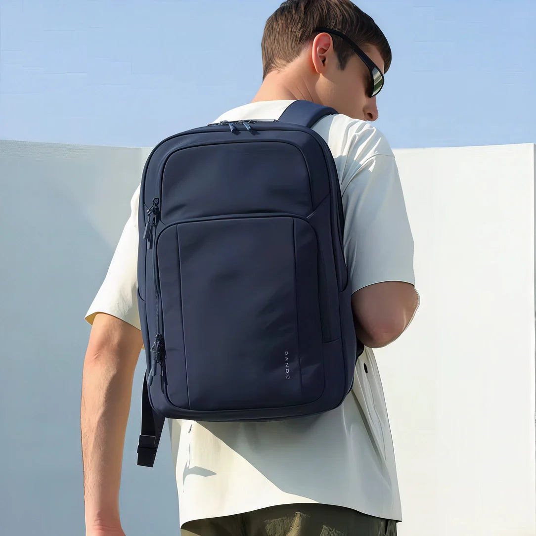 Sac à dos homme Dominus bleu marine avec poches multiples et housse ordinateur