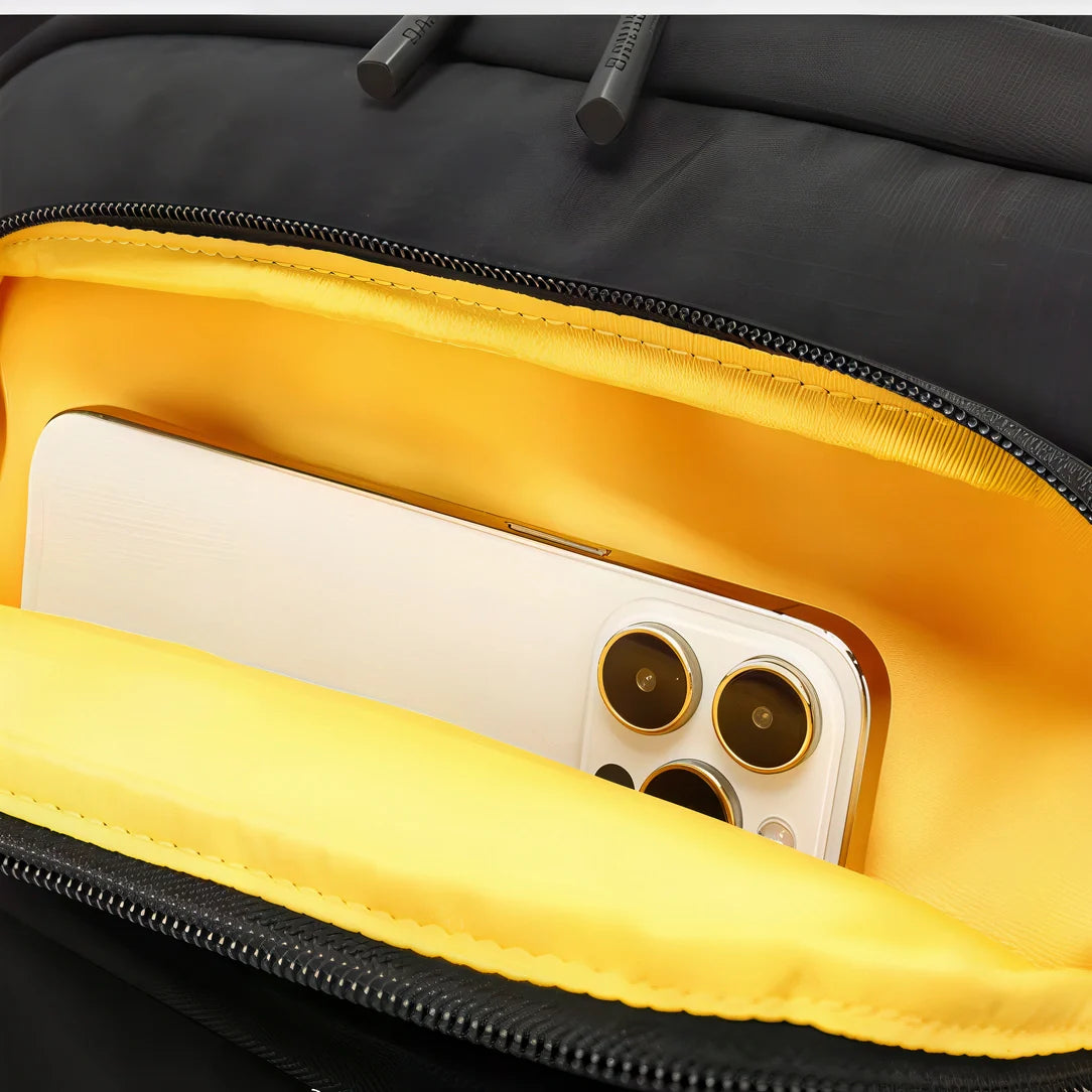 Coque téléphone rembourrée jaune et noire avec fermeture éclair Dominus
