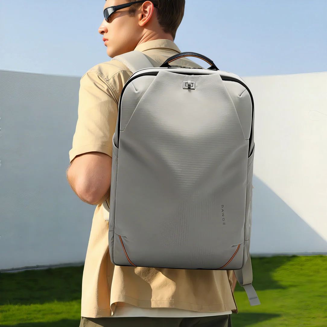 Sac à dos homme Nexar gris avec accents orange et détails de zip