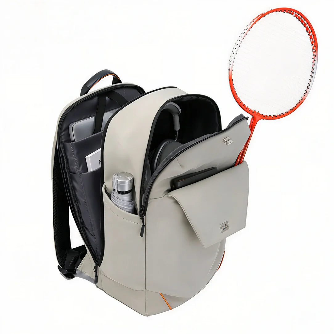 Sac à dos Nexar 20L gris avec accents orange/noir, poches multiples