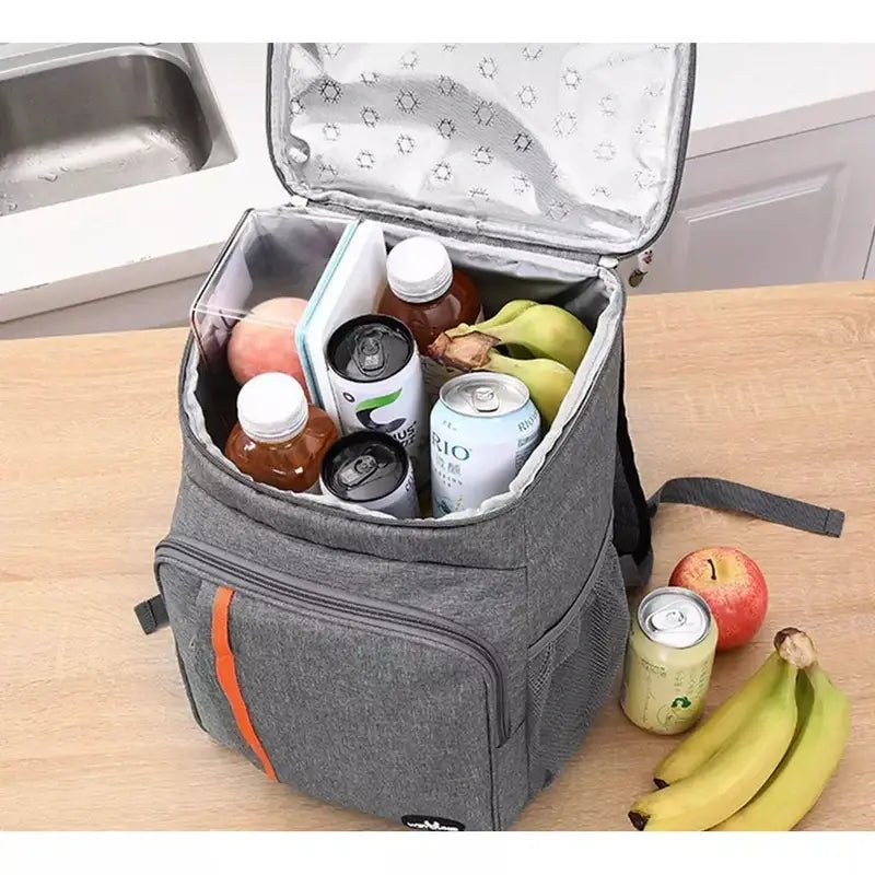 Sac à dos isotherme 20 litres gris avec boissons et fruits pour l’été