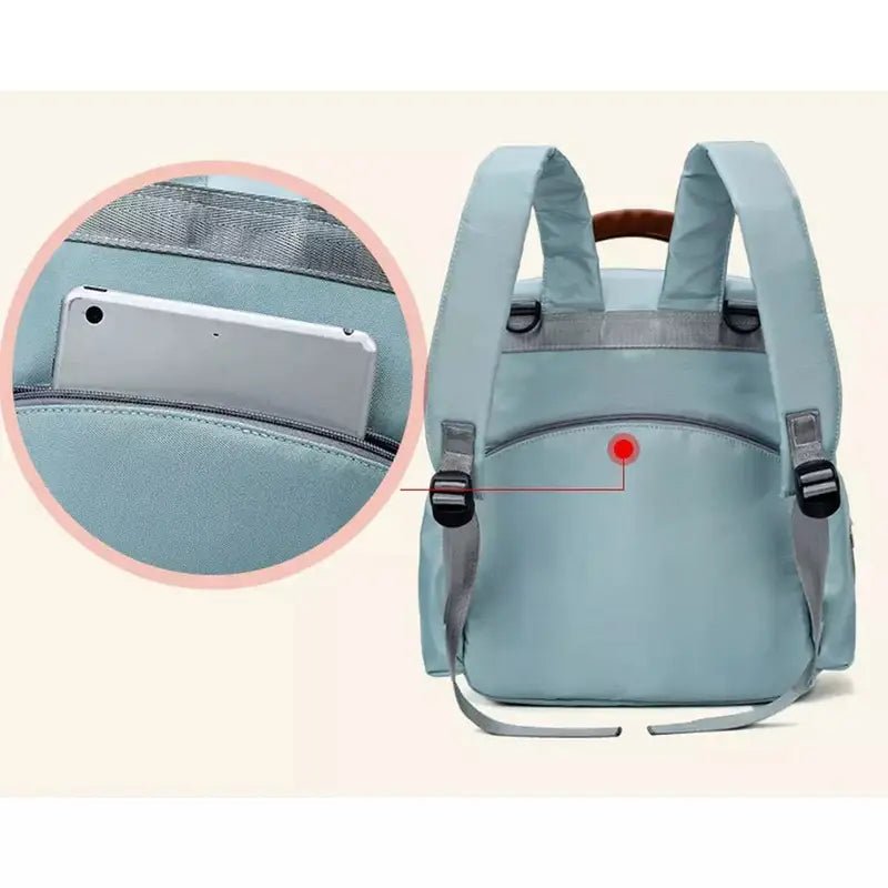 Sac à dos à langer bébé bleu clair avec poche secrète et smartphone à l’intérieur