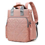 Sac à dos à langer bébé en rose poussière avec poche quiltée et poignées hautes