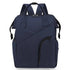 Sac à dos à langer chic en bleu foncé avec poches extérieures et zippers noirs