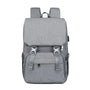 Sac à dos à langer ergonomique en tissu gris clair avec fermeture à rabat et port USB