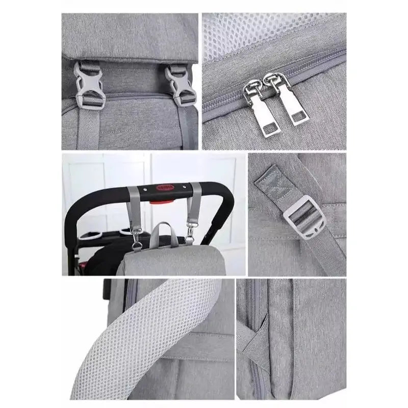 Sac à dos à langer ergonomique gris en tissu avec compartiments, boucles, fermetures et attaches pour poussette