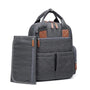 Sac à dos sac à langer gris foncé avec matelas à langer en cuir marron