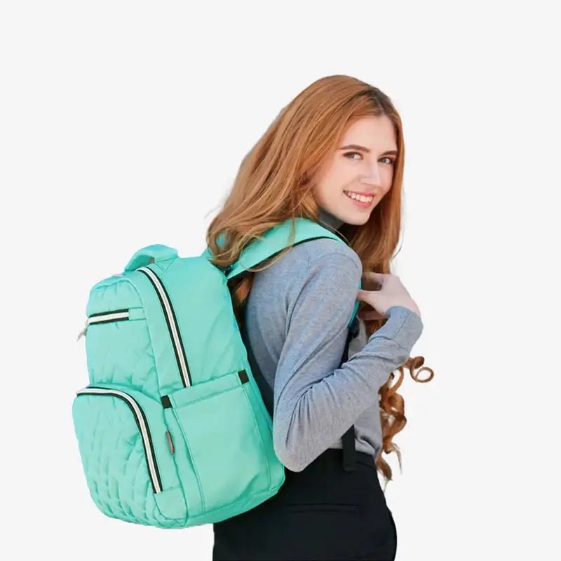Sac à dos à langer isotherme élégant vert menthe avec accents rayés noir et blanc