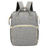 Sac à dos à langer lit gris chiné avec accents tan clair et zips dorés