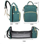 Sac à dos à langer lit vert convertible en berceau avec poches et bandoulière