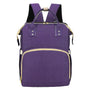 Sac à dos à langer lit violet avec zippers et poignées crème pour bébé et maman