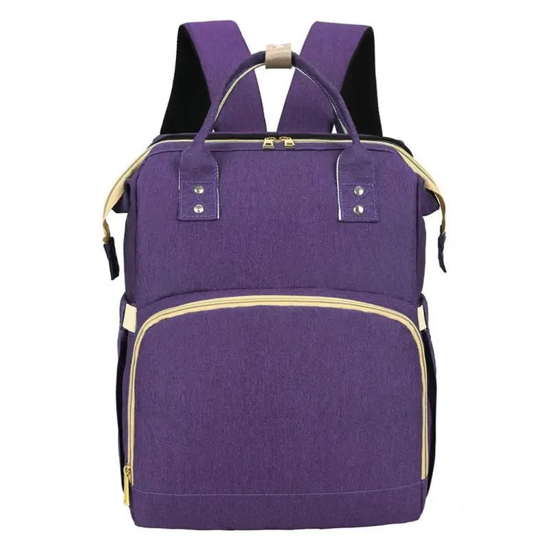 Sac à dos à langer lit violet avec zippers et poignées crème pour bébé et maman