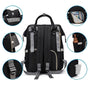 Sac à dos à langer tendance noir multifonction avec compartiments et bandes réfléchissantes