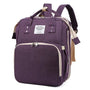 Sac à dos à langer USB en tissu violet avec accents beige et plusieurs compartiments zippés