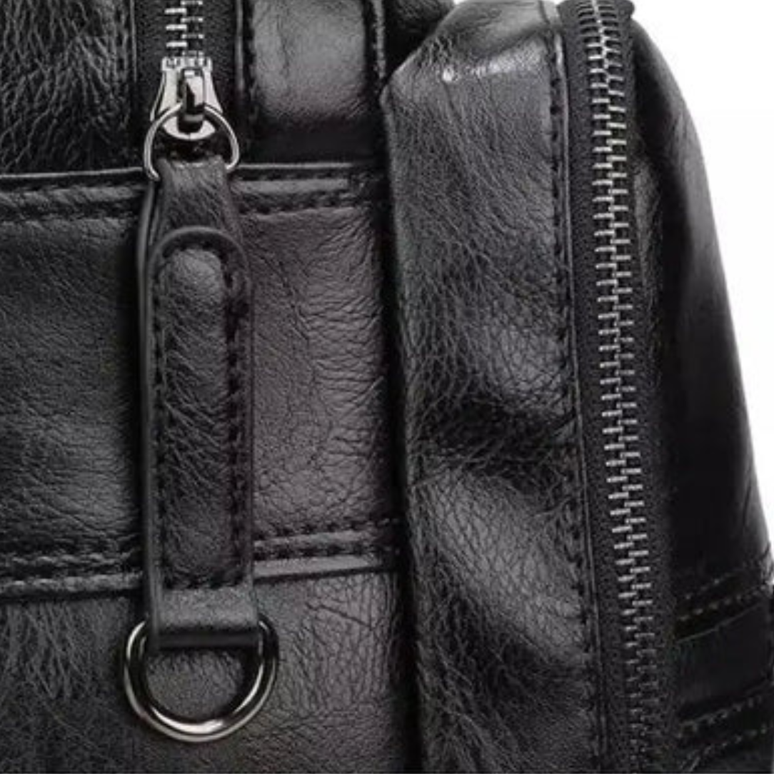 Sac à dos lustré noir balthazar en cuir texturé avec fermetures éclair argentées idéal sac à dos ordinateur