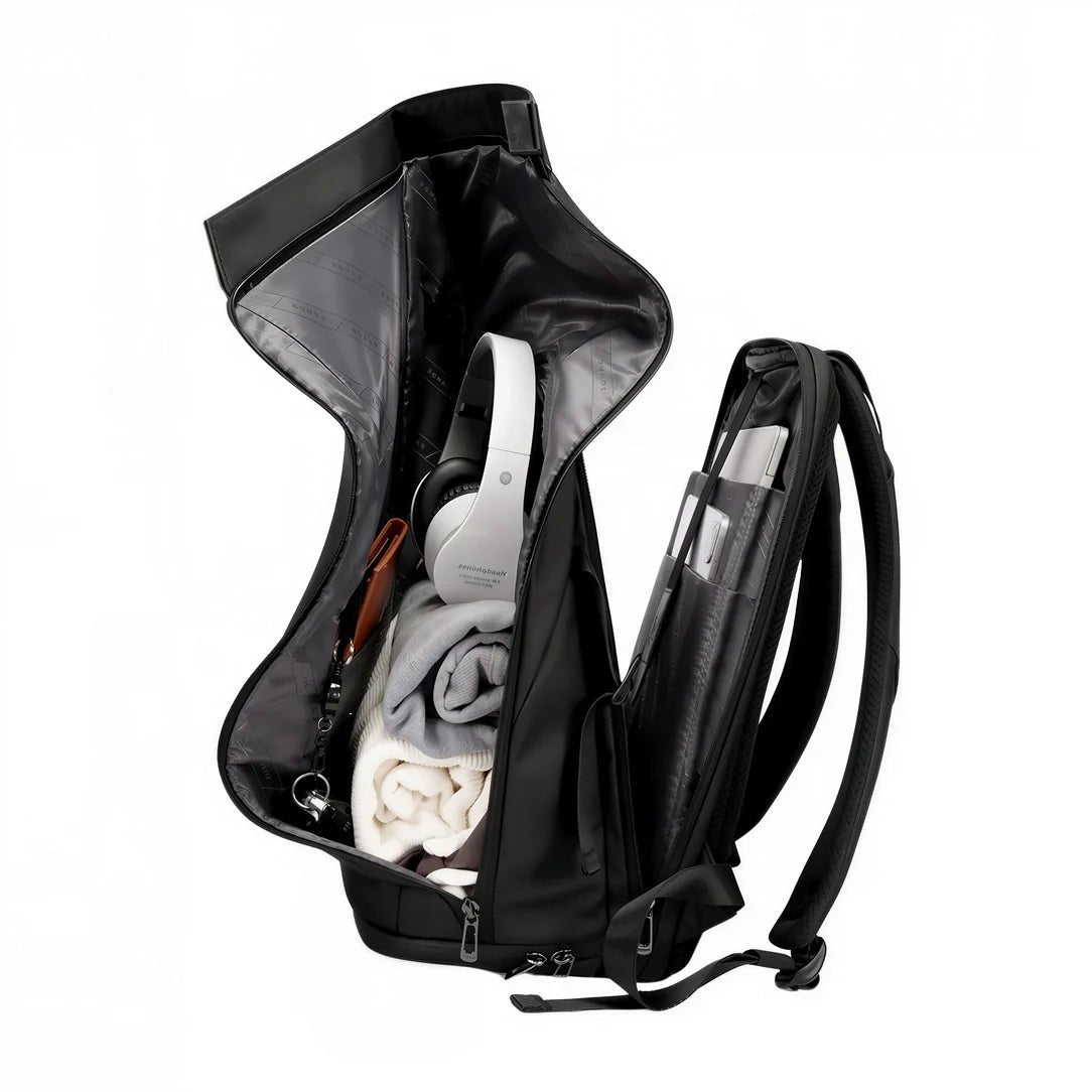 Sac à dos moderne roll top 16 pouces Calipso X ouvert avec casque, vêtements et ordinateur portable